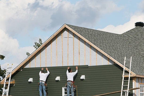 Professional Siding technician working in College Park, GA